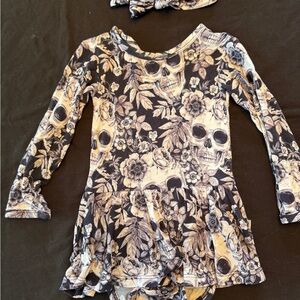 Bums and Roses skull twirl bodysuit